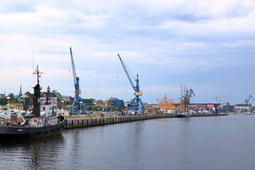 Fototapeta premium August 21 2020 - Rostock-Warnemünde, Mecklenburg-Vorpommern/Germany: view of the area of the city harbor of Rostock, germany