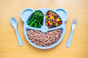 A plate of nutritional meals for children on the table