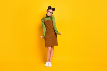 Full size photo of pretty lovely girl look good feel modest wear green jumper skirt overall isolated over vibrant color background