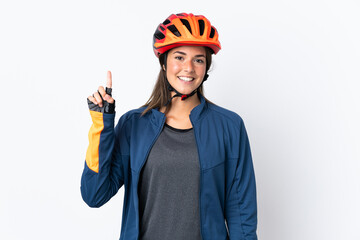 Young cyclist brazilian girl isolated on white  background pointing up a great idea - obrazy, fototapety, plakaty
