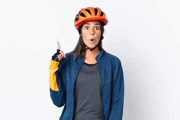 Young cyclist brazilian girl isolated on white  background intending to realizes the solution while lifting a finger up