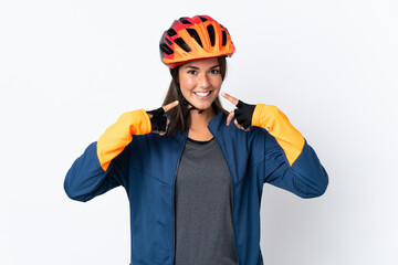 Young cyclist brazilian girl isolated on white  background giving a thumbs up gesture