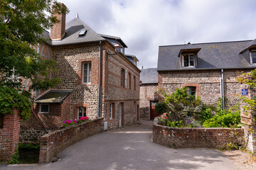 Fototapeta na wymiar Old buildings in a village of Normandy (France)