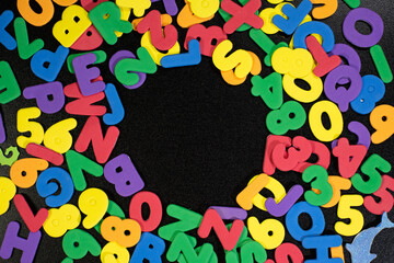 Random multi color alphabets in random position with circle frame kids children background back to school