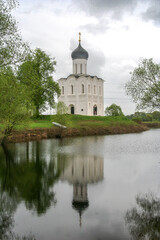 Fototapeta na wymiar Suzdal, Vladimir Oblast/ Russia- May 13th, 2012: The Church of the Intercession of the Holy Virgin on the Nerl River