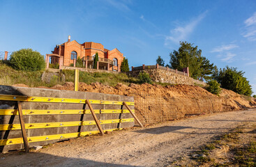 The construction of a retaining wall or counterfort, formwork, reinforced, preparation to pour...