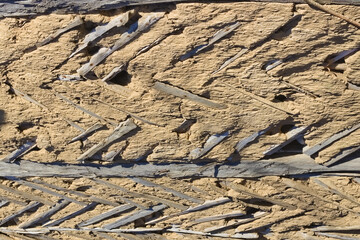 Texture of a clay wall of an old house. Background