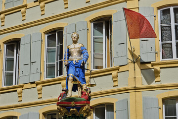 Justice fountain in the old town of Neuchatel, Switzerland