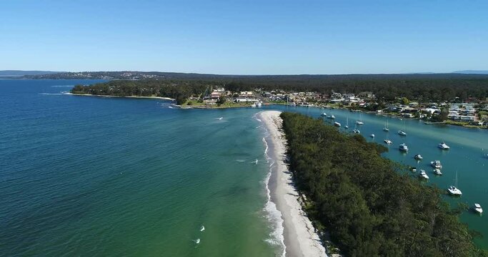 Huskisson town waterfront in Jervis bay &ndash; aerial flying over creek delta as 4k.
