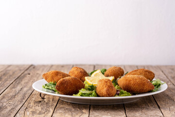 Traditional lebanese kibbeh on wooden table	