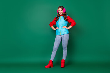 Full body size photo of lovely cute young lady hands hips smiling winter street posing wear pink...