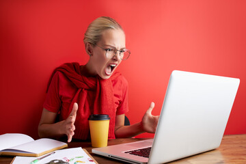 disgruntled woman look at laptop, dissatisfied with result on work. angry female feel herself...