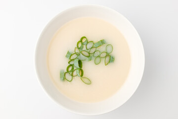 Beef bone broth on white background