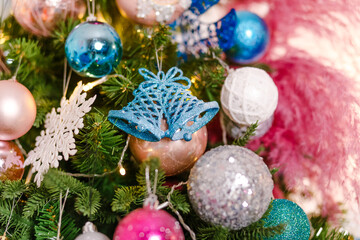 bells and balls on the Christmas tree
