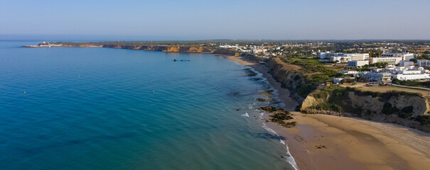 Playa de la Fontanilla beach and port of Conil seen from aerial view