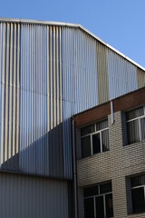 Fototapeta na wymiar Detail of the facade of a factory