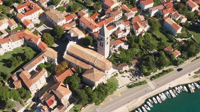 Historic town of Osor with bridge connecting islands Cres and Losinj, Croatia, aerial view from drone
