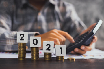 save and financial management concept, close up hand of business man calculate economy cash and ...