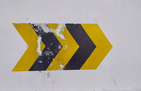 Black yellow directional sign - Visible Yellow Black Arrow Signs painted