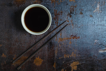 Soy sauce on a wooden background