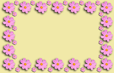 Fototapeta na wymiar Flower frame with Cosmea flowers on yellow background.