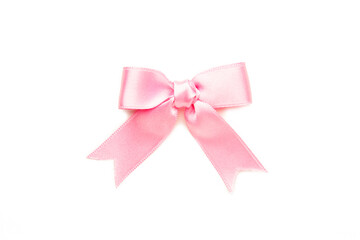 Pink gift bow isolated on white background.