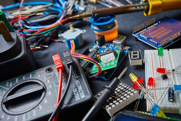 electronic board and tools repairs on black background