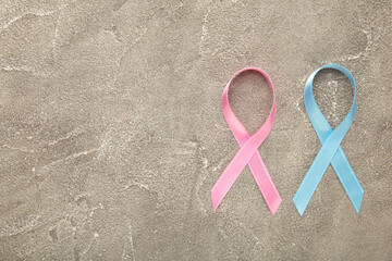 Blue and pink symbolic ribbon - the problem of cancer, breast cancer, prostate cancer ribbon.