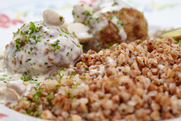 buckwheat with cutlets and sauce