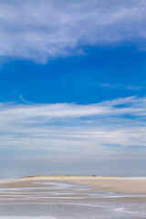 Fototapeta na wymiar Lonely beach on the west end of the East Frisian island Juist, Germany.
