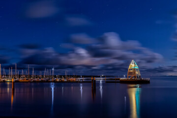 Harbour lit by the light of a full moon on the East Frisian island Juist, Germany.