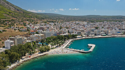 Fototapeta na wymiar Aerial drone photo of famous seaside area, organised beach and bay of Loutraki town, Corinthian bay, Greece