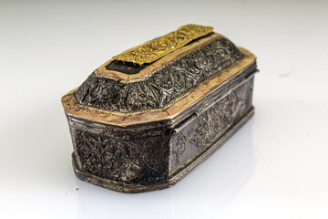 Metal antiques. Ancient decorative box made of gold and silver. Collection of the Pedir Museum, Aceh, Indonesia.