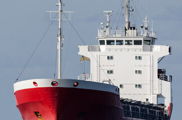 MERCHANT VESSEL - Red ship on a cruise at sea
