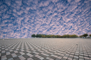Fototapeta premium City Square under the background of blue sky and white clouds