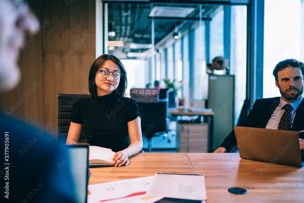 Wall mural smiling businesswoman on meeting in office boardroom