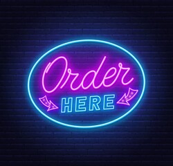 Order here neon sign on brick wall background .
