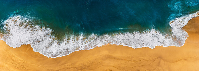 Panorama of a clean beach. Aerial photography of a clean sandy beach. Beautiful beach with yellow...