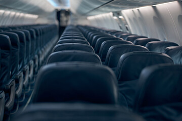 Photo of empty seats in economy class airplane