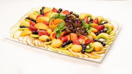 beautiful fruit bouquet apples kiwi currants strawberries mint on a tray