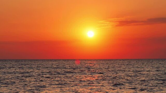 Sea sunrise over ripple water, deep ocean waves