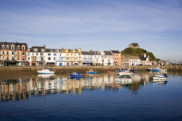 Fototapeta na wymiar Ilfracombe is a seaside resort and civil parish on the North Devon coast, England, with a small harbour surrounded by cliffs.