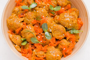 Vegan dish with micro greens and soy meat close up