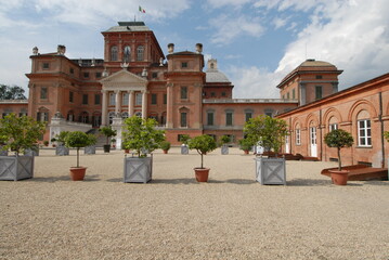 The royal red castle of Racconigi is located in the province of Cuneo in Piedmont, but close to...
