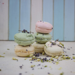 french macaroons on wooden background
