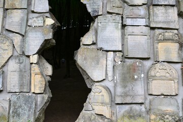 Kazimierz Dolny, Poland. Jewish cemetery with a cracked wailing wall in Czerniawy. The lapidarium,...