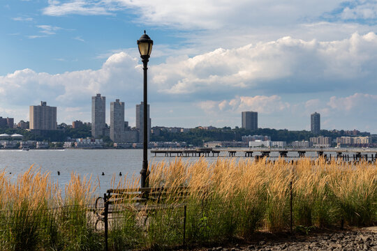Riverside Park South along the Hudson River with a Street Light and View of New Jersey in Lincoln Square New York during Summer
