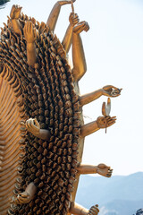 close up of golden hands statue