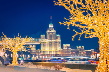 Festive Moscow. Christmas in the capital of Russia. Christmas illumination in the center of Moscow. Trees with garlands on the background of snow. Holiday decorations in the Russian capital. New year