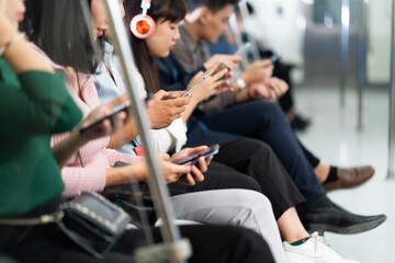 Diversity Crowd of passengers on Urban Public Transport Metro. Asian people go to work by public...